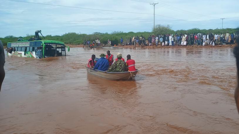 Passengers of a bus that was swept away by floodwaters are rescued by boat, near Garissa, northern Kenya, Tuesday, April 9, 2024. Police said some of the passengers managed to escape just before the bus was submerged, while others climbed onto the roof. The incident happened just hours after Kenya's roads agency announced the closure of another section of the same road that was flooded after the Tana River swelled due to continuing heavy rains. (AP Photo)