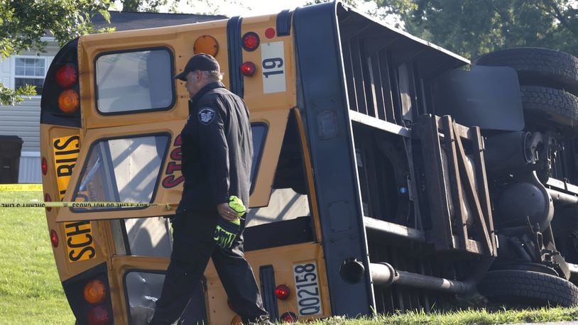 At least one person was killed after a Northwestern school bus was involved in a crash on Route 41 in German Twp. Tuesday, Aug. 22, 2023. BILL LACKEY/STAFF