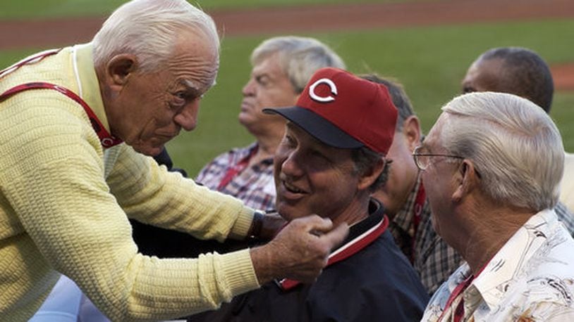 Sparky Anderson (left) chats with pitching coach Don Gullett and former player Tommy Helms during Joe Nuxhall Night at Great American Ballpark in 2004. FILE PHOTO