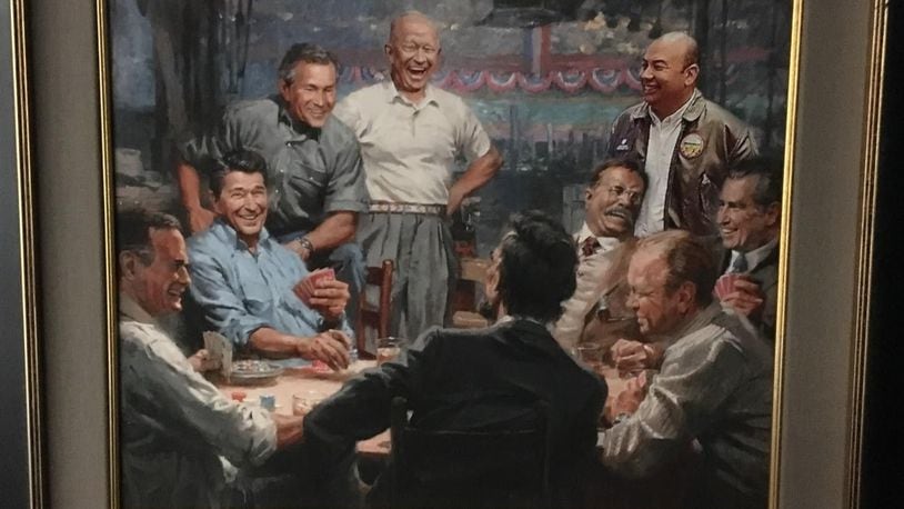Among the artwork removed was a painting of presidents playing poker with Rosenberger (upper right) overlooking the table. Photo courtesy of 3rdRailPolitics.com