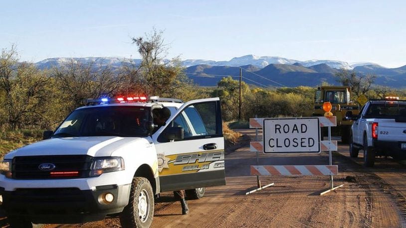 The road is closed near Tonto Creek after a vehicle was washed away by flood waters two weeks ago.
