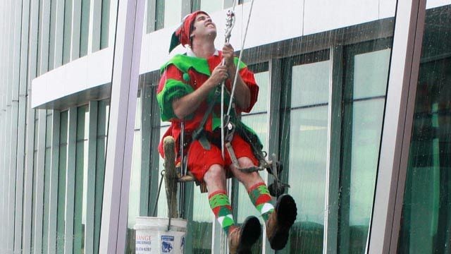 High flying elves wash windows at Nemours Children's Hospital in Orlando