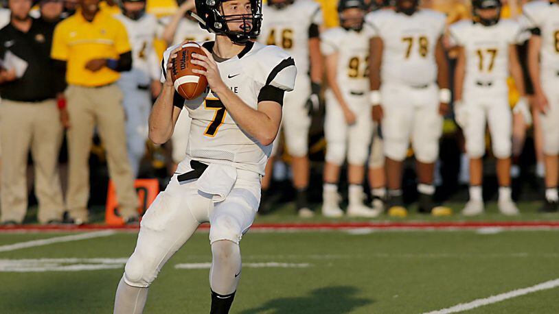 Centerville quarterback Alec Grandin looks for a receiver during a Week 1 win at Fairfield. Contributed photo by E.L. Hubbard