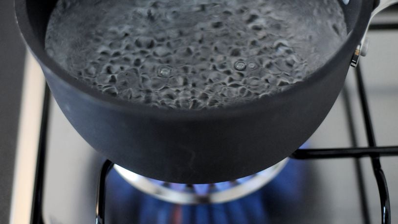 In this photo illustration, water comes to the boil on a gas stove. The hot water challenge on YouTube is drawing concern from parents once again. (Photo by Vittorio Zunino Celotto/Getty Images)