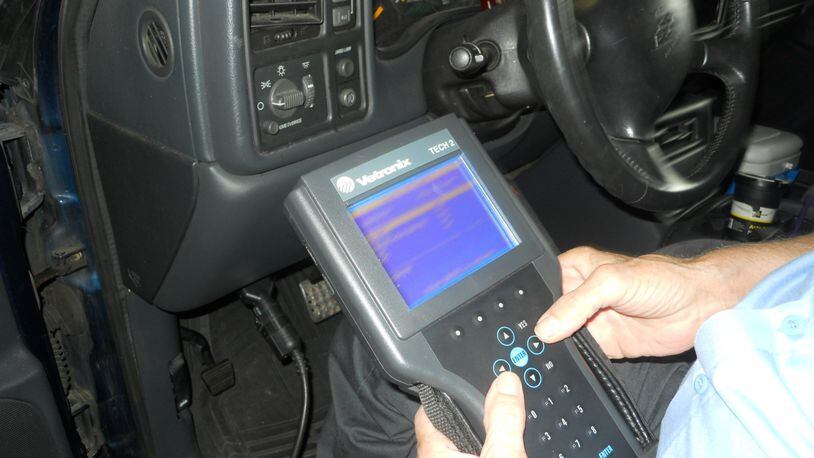 A scan tool is used to check for any diagnostic trouble codes that may be present in a vehicle in for service or repair. James Halderman photo