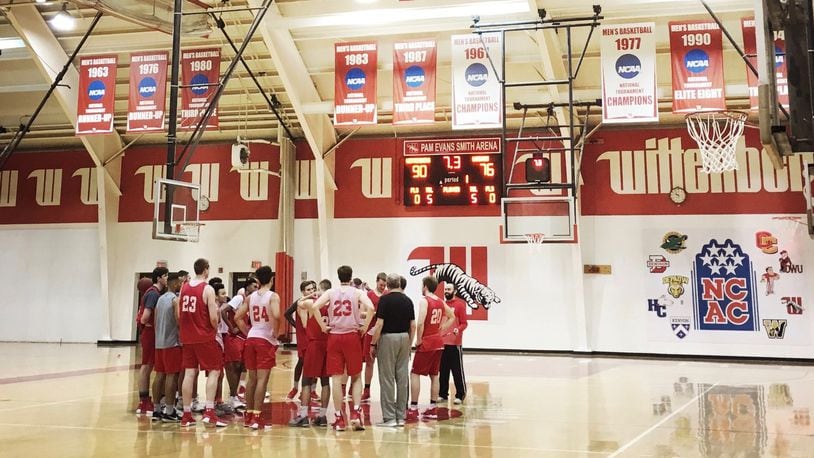 Wittenberg huddles at the end of practice on Monday, Feb. 5, 2018, at Pam Evans Smith Arena in Springfield. David Jablonski/Staff