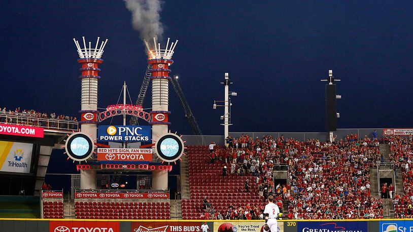 CINCINNATI, OH - MAY 15: General view as players and fans watch one of the outfield smokestacks on fire in the sixth inning of the game between the San Francisco Giants and Cincinnati Reds at Great American Ball Park on May 15, 2015 in Cincinnati, Ohio. The Giants defeated the Reds 10-2. (Photo by Joe Robbins/Getty Images)