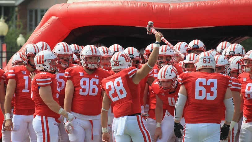 Wittenberg players prepare to run onto the field before a game against SUNY Cortland on Saturday, Sept. 4, 2021, at Edwards-Maurer Field in Springfield. David Jablonski/Staff