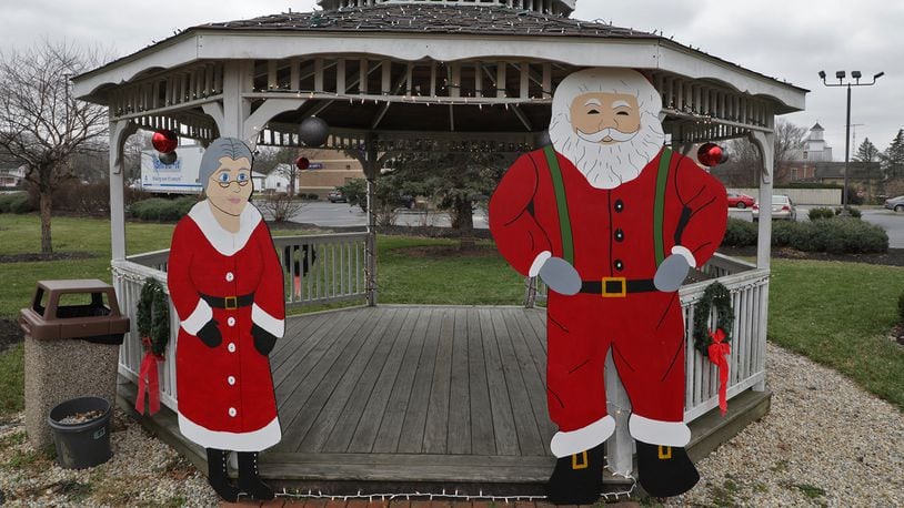 A class at Greenon High School has made holiday cutouts for the Village of Enon. The cutouts have been placed in parks and public areas around the village. BILL LACKEY/STAFF