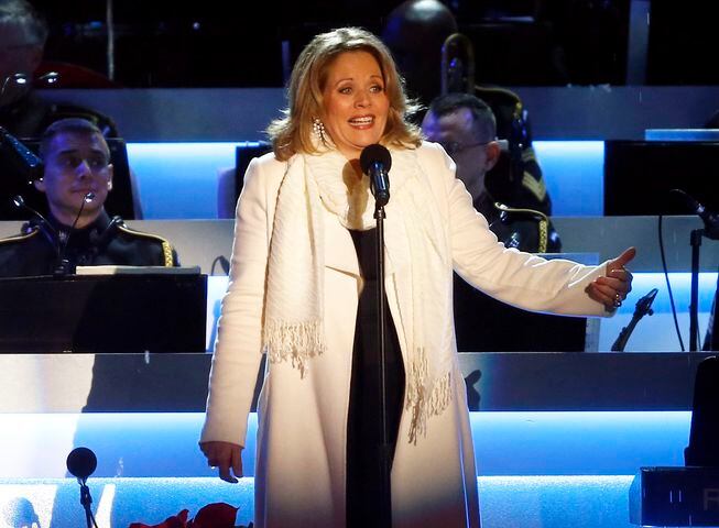 Bet: If Renee Fleming wears gloves when she starts singing US National Anthem, what color will they be: White, black, red or another color?