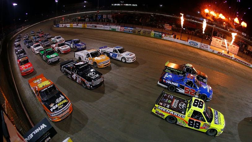 ROSSBURG, OH - JULY 19: The field does a 4 wide parade lap before the start of the NASCAR Camping World Truck Series 5th Annual Dirt Derby 150 at Eldora Speedway on July 19, 2017 in Rossburg, Ohio. (Photo by Sean Gardner/Getty Images)