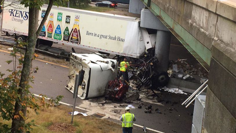 A tractor trailer filled with salad dressing crashed into a bridge Tuesday morning. The load of dressing spilled across the highway.