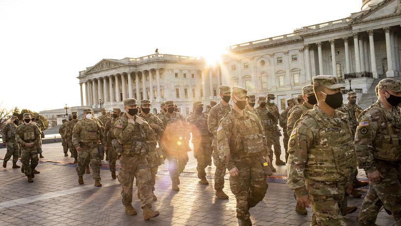 National Guard troops muster outside the Capitol in Washington, Thursday, Jan. 14, 2021. Federal investigators are trying to figuring out how many military and police personnel may have taken part in the violent attack on the Capitol, a law enforcement official said on Thursday. (Jason Andrew/The New York Times)