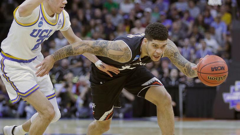 Cincinnati guard Jarron Cumberland, right, drives against UCLA Lonzo Ball during the first half of a second-round game of the NCAA men’s college basketball tournament in Sacramento, Calif., Sunday, March 19, 2017. (AP Photo/Rich Pedroncelli)