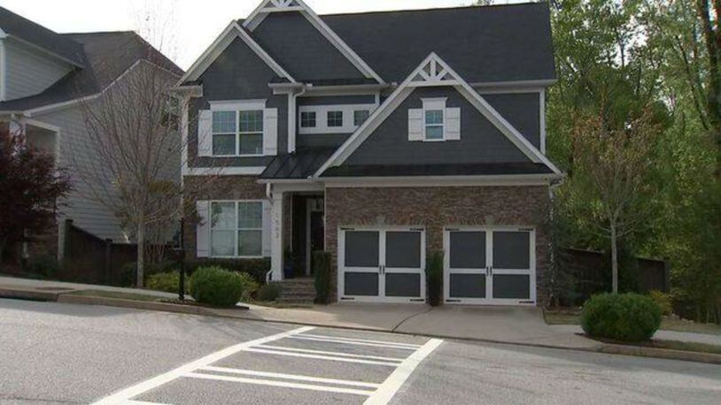 A man returned home and found a crosswalk was painted leading to his driveway. (Photo: WSBTV.com)