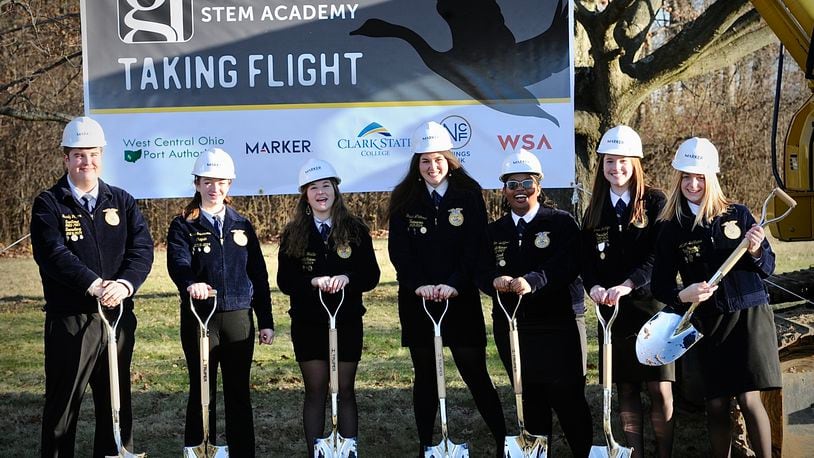 Students from Global Impact STEM Academy took part in the groundbreaking Thursday, December 14, 2023 for the new “Upper Academy” facility on Clark State College’s campus. From left, Brady Payton, Lara Rittenhouse, Sarah Waddle, Grace Whitmore, Jaiden Welliford, Josie Jennings and Allison Devanna. MARSHALL GORBY\STAFF