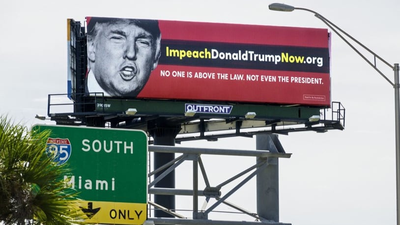 A billboard urging impeachment of Donald Trump faces Southern Boulevard at I-95 in West Palm Beach Friday, September 1, 2017.