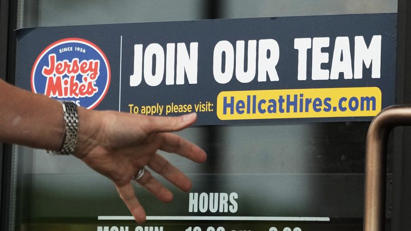 A hiring sign is displayed at a restaurant in Glenview, Ill., Thursday, May 2, 2024. On Thursday, May 9, 2024, the Labor Department reports on the number of people who applied for unemployment benefits last week. (AP Photo/Nam Y. Huh)