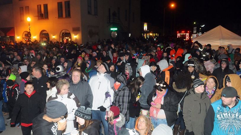 Thousands of people have crowded Main Street in New Carlisle on to watch the annual ball drop. MARSHALL GORBY/STAFF/FILE