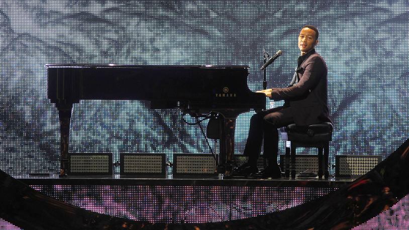 John Legend performing at the Rose Music Center in Huber Heights in June. TY GREENLEES / STAFF
