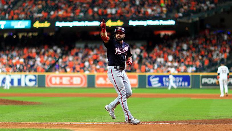 The Nationals' Adam Eaton celebrates his two-run home run against the Houston Astros during the eighth inning in Game Two of the 2019 World Series at Minute Maid Park on October 23, 2019 in Houston, Texas. (Photo by Mike Ehrmann/Getty Images)