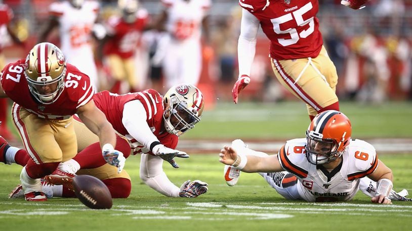 SANTA CLARA, CALIFORNIA - OCTOBER 07: Quarterback Baker Mayfield #6 of the Cleveland Browns fumbles as he is the ball is pursued by Nick Bosa #97 of the San Francisco 49ers during the game at Levi’s Stadium on October 07, 2019 in Santa Clara, California. (Photo by Ezra Shaw/Getty Images)