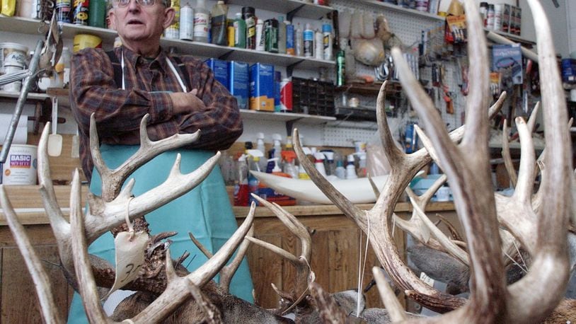 Bob Anderson in the back part of his shop off on Collier Road. Anderson started doing taxidermy in the late 1940s. Staff photo