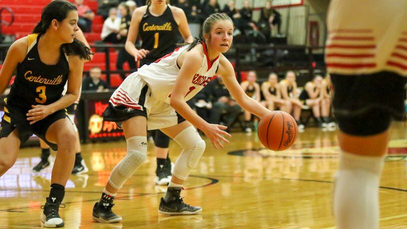 Cutline: Tecumseh High School junior Mae Mastin looks for a teammate during their game against Centerville on Jan. 28, 2019. The Arrows are 5-1 and 3-0 in the Central Buckeye Conference Kenton Trail Division this winter. CONTRIBUTED PHOTOS BY MICHAEL COOPER