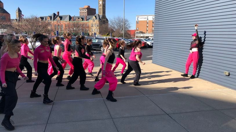 A dance team rehearses outside the Hollenbeck Bayley Creative Arts and Conference Center prior to Sunday's Dance Stomp Shake competition at the Clark State Performing Arts Center.