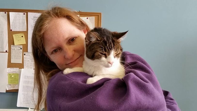 Robyn McGeorge holds 18-year-old Robyn’s Nest resident Georgie, who came to Robyn’s Nest at 13, wasn’t adopted and decided to stay. CONTRIBUTED
