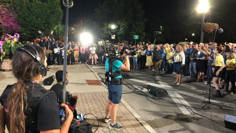 A professional crew films the featured performers and chorus performing Saturday night in Springfield for what will be the finale of a pilot film for ABC Disney.