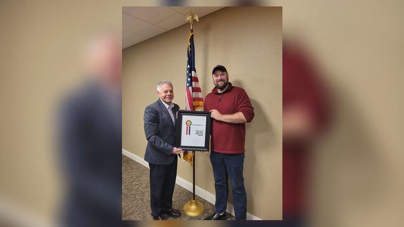 The Abilities Connection (TAC) CEO Jim Zahora (left) and Mike Spada (right) , TAC quality coordinator and Marin
veteran, showcase the organization’s fifth HIRE Vets Medallion Award. Contributed