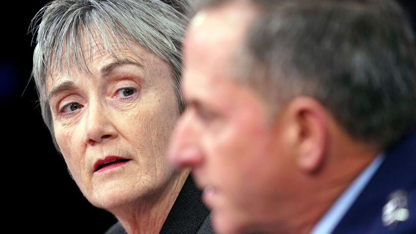 Air Force Secretary Heather Wilson, left, listens to Gen. David L. Goldfein, right, Chief of Staff of the U.S. Air Force at the Pentagon, Thursday, Nov. 9, 2017.