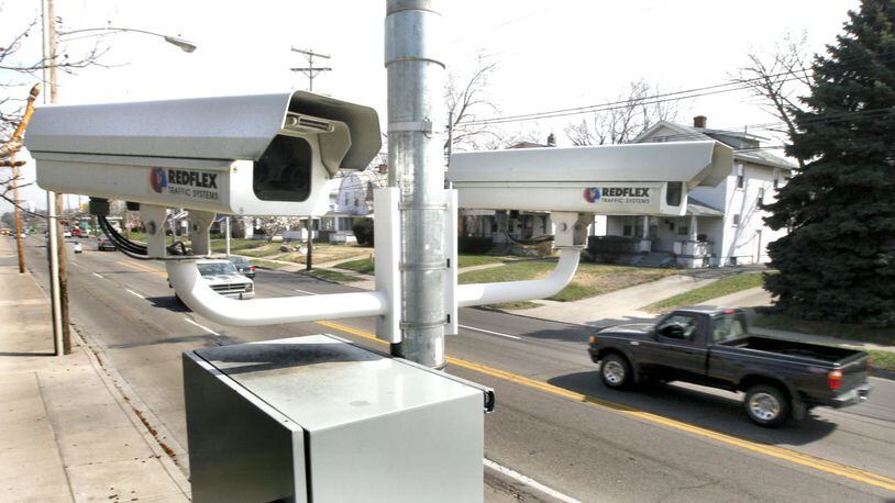 Traffic enforcement cameras monitor traffic along Smithville Rd. in Dayton. More than 150 speeding tickets a day were issued last year by the Dayton Police Department. Motorists were cited 58,226 times in 2012. A Dayton Daily News investigation found only 2,649 were written by a police officer. That means six tickets an hour were issued by a half a dozen speeding cameras located in the city. LISA POWELL / STAFF