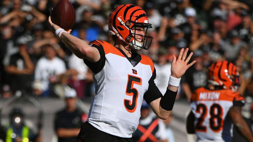 OAKLAND, CALIFORNIA - NOVEMBER 17: Ryan Finley #5 of the Cincinnati Bengals attempts a pass against the Oakland Raiders during their NFL game at RingCentral Coliseum on November 17, 2019 in Oakland, California. (Photo by Robert Reiners/Getty Images)