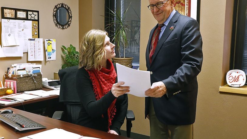 Clark County Commissioner John Detrick talks with Megan Lokai in the Commission Offices on Tuesday. Bill Lackey/Staff
