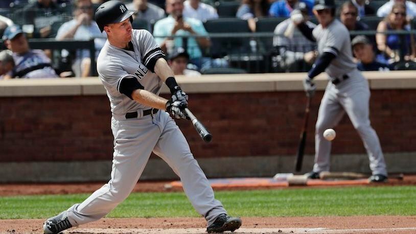 New York Yankees' Todd Frazier hits an RBI single during the second inning of a baseball game against the Tampa Bay Rays Wednesday, Sept. 13, 2017, in New York. (AP Photo/Frank Franklin II)