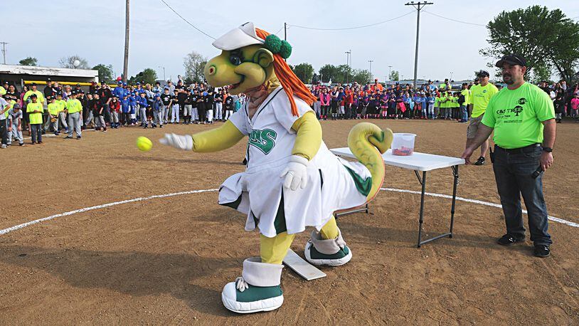 Gem, one of the mascots for the Dayton Dragon baseball team, helped kick off the softball season in New Carlisle a few years ago. Staff photo/Marshall Gorby