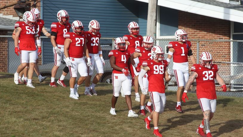 Wittenberg takes the field before a game against Kenyon on Saturday, Sept. 16, 2023, at Edwards-Maurer Field in Springfield. David Jablonski/Staff