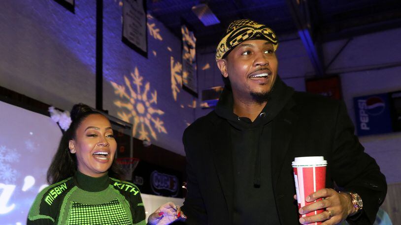 NEW YORK, NY - DECEMBER 17:  La La Anthony (L) and Carmelo Anthony attend the 3rd Annual Winter Wonderland Holiday Charity Event Hosted By La La Anthony at Gauchos Gym on December 17, 2018 in New York City.