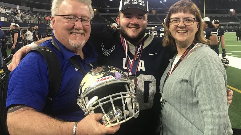 Alex Temple with his parents Steve and Pam. CONTRIBUTED