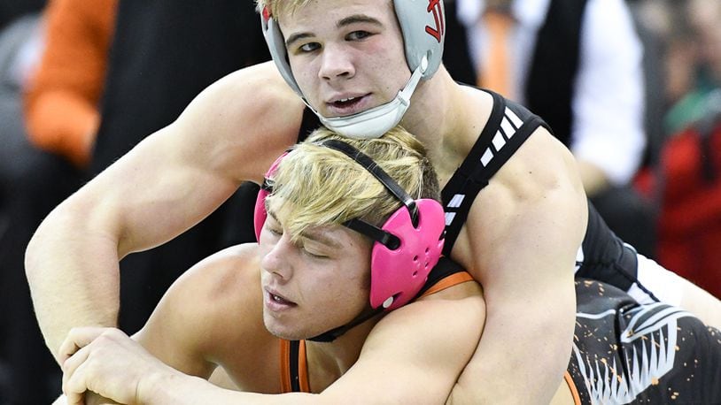 Graham’s Rocky Jordan (top) tries to pin Ashland’s Sid Ohi during the 152-pound Division II state match on Saturday at Value City Arena. Jordan won the title. Contributed Photo by Bryant Billing