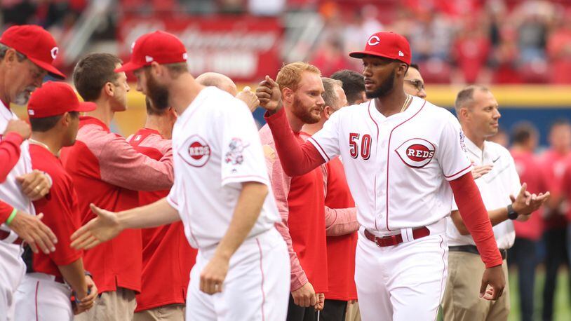 Reds pitcher Amir Garrett (50) is introduced on Opening Day before a game against the Phillies on Monday, April 3, 2017, at Great American Ball Park in Cincinnati. David Jablonski/Staff