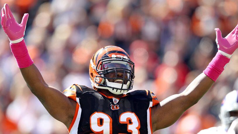 CINCINNATI, OH - OCTOBER 02: Michael Johnson #93 of the Cincinnati Bengals celebrates during the 23-20 victory against the Buffalo Bills at Paul Brown Stadium on October 2, 2011 in Cincinnati, Ohio. (Photo by Andy Lyons/Getty Images)