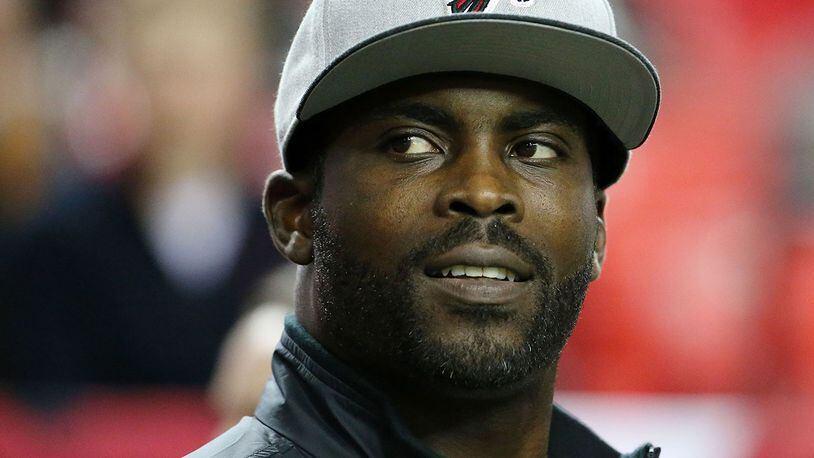 Former Atlanta Falcons player Michael Vick stands on the field prior to the game against the New Orleans Saints at the Georgia Dome on January 1, 2017 in Atlanta, Georgia. (Photo by Maddie Meyer/Getty Images)