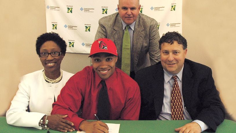 Northmont High School's Blake Beemer recently signed a letter of intent to play baseball for Ball State University. Joining Blake at the ceremony were his mother, Elizabeth, and father, Greg. Standing is Northmont baseball coach Chuck Harlow. Beemer was a first-team All-GWOC selection at first base. He batted .422 to help the Thunderbolts finish the season with a 23-7 record.