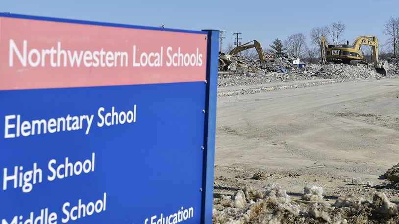 There’s nothing left of Northwestern Middle School but rubble Friday as a demolition crew finishes knocking the building down. The elementary school is the only original building still standing and it is scheduled join the other two today. Bill Lackey/Staff