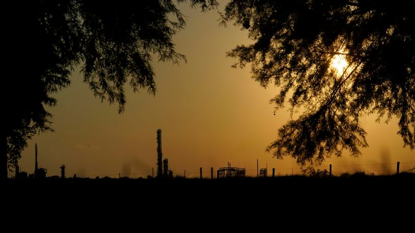 FILE - The Denka Performance Elastomer Plant sits at sunset in Reserve, La., on Sept. 23, 2022. The Environmental Protection Agency on Tuesday, April 9, 2024, issued a rule that will force more than 200 chemical plants nationwide to reduce toxic compounds that cross beyond their property lines, exposing thousands of people to elevated cancer risks. The rule will significantly reduce harmful emissions at the Denka Performance Elastomer facility, the largest source of chloroprene emissions in the country, EPA Administrator Michael Regan said. (AP Photo/Gerald Herbert, File)