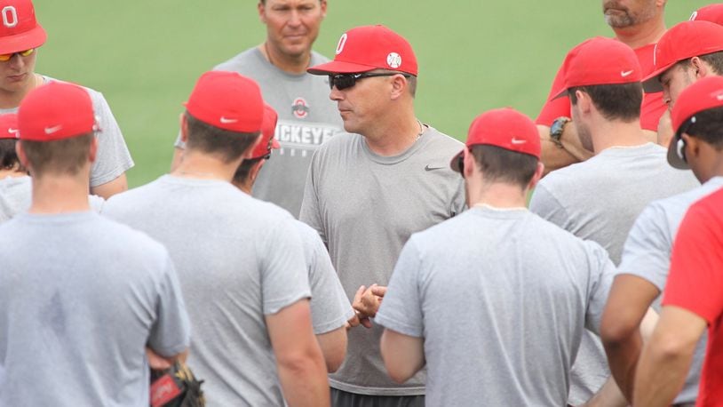 Ohio State baseball coach Greg Beals talks to his players during a practice on Tuesday, May 31, 2016, at Bill Davis Stadium in Columbus. David Jablonski/Staff