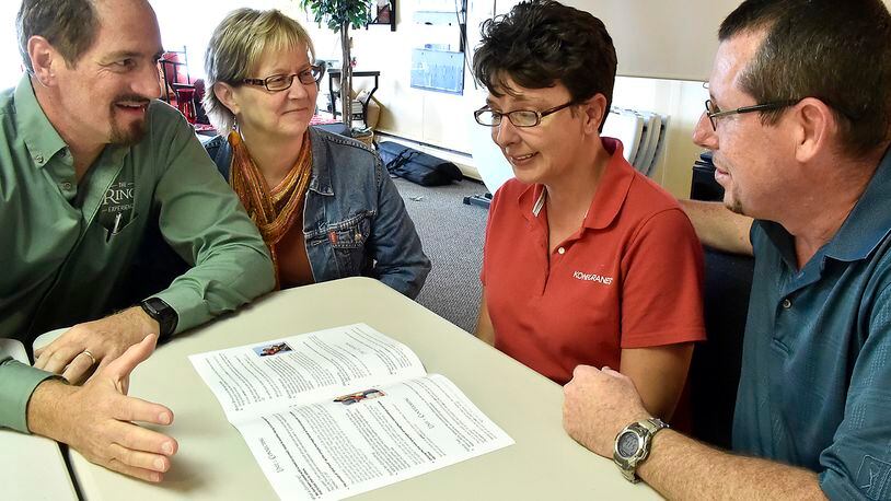 Chris and Amy Pruett, right, talk with the Marriage Resource Center’s Lavern and Rhonda Nissley in 2014. The resource center has now teamed up with Citi Lookout after some of its grants ended. Bill Lackey/Staff
